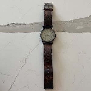 Men’s Nixon watch. Brown distressed leather band
